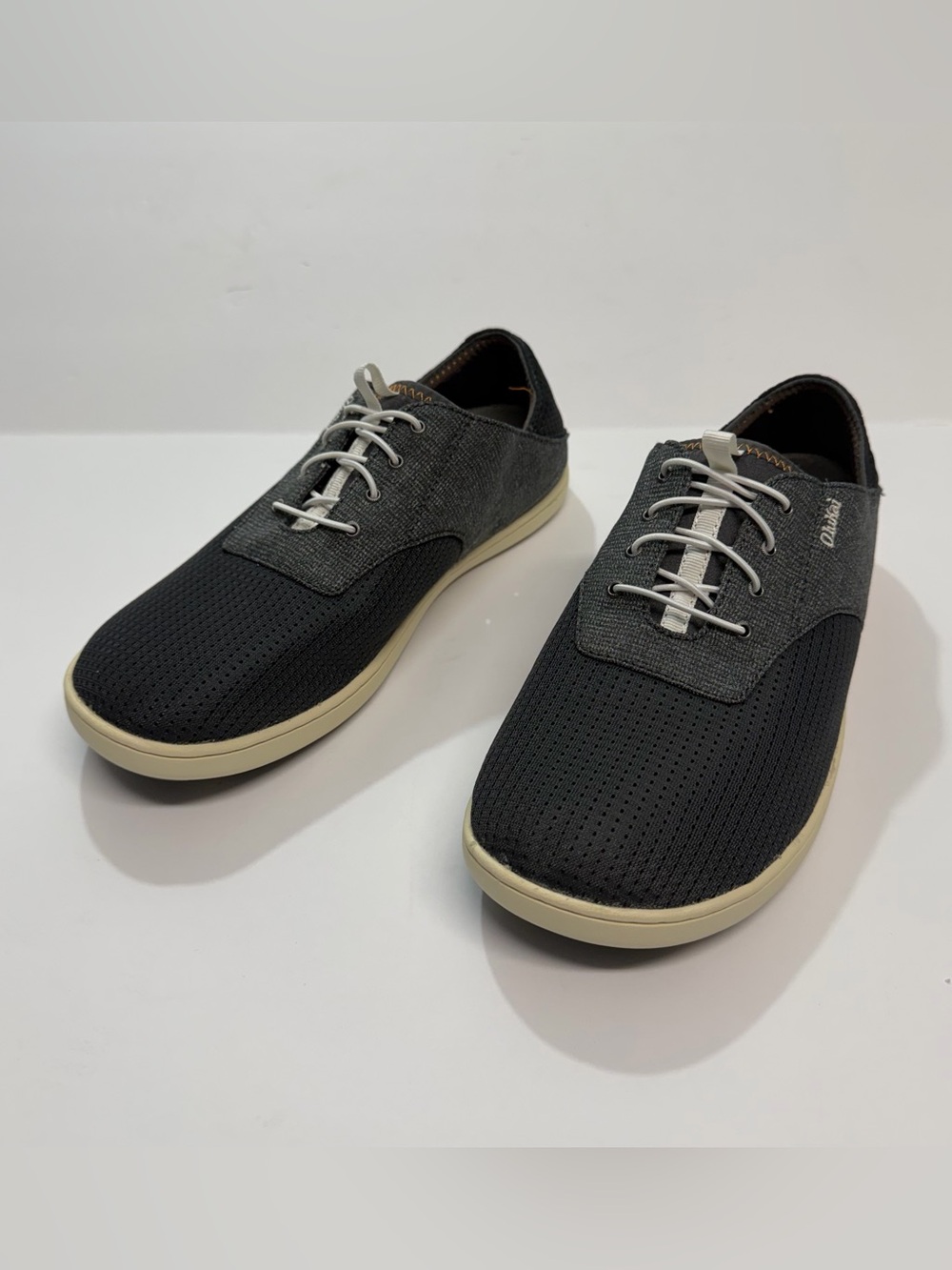 OluKai Men's Black and Cream Casual Perforated Slip-On Sneakers